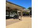 Community clubhouse featuring covered outdoor seating, ceiling fans, and ample space for gatherings at 630 Bluff Oak Ct, Roswell, GA 30076