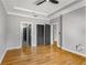 Hardwood floors in bedroom with ceiling fan and neutral paint at 850 Piedmont Ne Ave # 2509, Atlanta, GA 30308