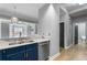 Kitchen with stainless steel dishwasher and sink with view to living room at 850 Piedmont Ne Ave # 2509, Atlanta, GA 30308