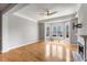 Bright living room features a fireplace, hardwood floors, and large windows at 850 Piedmont Ne Ave # 2509, Atlanta, GA 30308