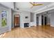 Spacious living room with fireplace, hardwood floors, and access to outdoor at 850 Piedmont Ne Ave # 2509, Atlanta, GA 30308