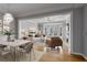 Bright living room with hardwood floors, neutral paint, a fireplace, and large windows at 850 Piedmont Ne Ave # 2509, Atlanta, GA 30308
