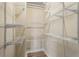 Walk-in closet with custom adjustable shelving at 850 Piedmont Ne Ave # 2509, Atlanta, GA 30308