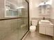 Contemporary bathroom featuring a walk-in shower with glass enclosure and vessel sink at 1098 Eastview Ne Cir, Conyers, GA 30012