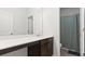 Bathroom featuring a vanity with sink and a shower with a blue curtain at 305 Knights Ct, Canton, GA 30115