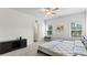 Bright bedroom with a large window and neutral decor at 305 Knights Ct, Canton, GA 30115