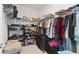 Walk-in closet with lots of clothes and shelving at 305 Knights Ct, Canton, GA 30115