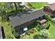 Aerial view of the backyard featuring a deck, patio, and well-manicured landscaping at 4360 Pleasant Forest Dr, Decatur, GA 30034