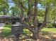Quaint single-story home with mature trees, and decorative mailbox at 4360 Pleasant Forest Dr, Decatur, GA 30034