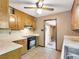 Kitchen with wood cabinets and light countertops at 4360 Pleasant Forest Dr, Decatur, GA 30034