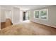 Bright living room features neutral walls, and large windows, offering ample natural light at 4360 Pleasant Forest Dr, Decatur, GA 30034