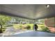 Covered patio with an open view to the landscaped front yard at 4360 Pleasant Forest Dr, Decatur, GA 30034