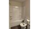 Clean, bright bathroom with a tub and shower combination at 6424 Rosetta Dr, South Fulton, GA 30331