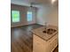 Open-concept kitchen features a large island with a double sink and plenty of light at 6424 Rosetta Dr, South Fulton, GA 30331