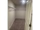 Walk-in closet featuring carpet and wire shelving at 6424 Rosetta Dr, South Fulton, GA 30331