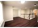Bonus room area showcasing an open layout and hardwood floors at 1142 Terrasol Rdg, Lilburn, GA 30047