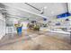 Spacious garage featuring ample storage shelves, a clean floor, and plenty of room for vehicles and equipment at 1188 Woodtrace Ln, Auburn, GA 30011