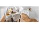 Cozy bonus room with dining area, kitchenette, and comfortable seating at 1188 Woodtrace Ln, Auburn, GA 30011