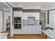 Gourmet kitchen with sleek appliances, ample counter space, and custom cabinetry at 1315 Badingham Dr, Cumming, GA 30041