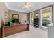 Cozy home office with natural light, neutral colors, and built-in shelving at 1315 Badingham Dr, Cumming, GA 30041