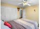 Relaxing bedroom with a ceiling fan and a large closet, offering plenty of storage space at 6851 Roswell Rd # B15, Sandy Springs, GA 30328