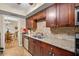 Modern kitchen features stainless steel appliances, granite counters, and updated backsplash at 6851 Roswell Rd # B15, Sandy Springs, GA 30328