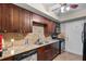 Updated kitchen featuring granite counters, stainless steel appliances, and modern cabinets at 6851 Roswell Rd # B15, Sandy Springs, GA 30328