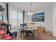 Bright dining area with stylish chandelier and natural light at 928 Rocky Creek Rd, Hampton, GA 30228