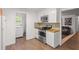 Modern kitchen with stainless steel appliances and tile backsplash at 928 Rocky Creek Rd, Hampton, GA 30228