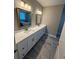 Bathroom featuring a double vanity with white marble countertops at 169 Long Dr, Marietta, GA 30060
