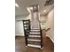 Staircase featuring hardwood treads and decorative railing at 169 Long Dr, Marietta, GA 30060