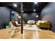 Finished basement features stylish decor, comfortable seating, and modern lighting, perfect for entertaining at 2152 Tourney Dr, Marietta, GA 30062