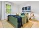 Bedroom with queen bed, side tables, neutral carpet, and natural light from the window at 2152 Tourney Dr, Marietta, GA 30062