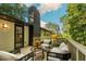 Inviting deck area with seating offers a tranquil space for outdoor living and entertaining at 2152 Tourney Dr, Marietta, GA 30062
