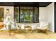 Cozy front porch with modern chairs and a small table, ideal for enjoying outdoor relaxation at 2152 Tourney Dr, Marietta, GA 30062