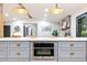 View of modern kitchen appliances and countertop from the gray kitchen island at 2152 Tourney Dr, Marietta, GA 30062