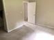 Cozy bedroom featuring neutral walls, carpeted floors, and a closet at 2617 Terrace Pkwy, Morrow, GA 30260