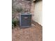 Goodman AC unit surrounded by pine needles and next to brick wall at 3358 Stonecrest Ct, Atlanta, GA 30341