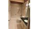 This bathroom is equipped with a shower, tub, and a vanity with a black countertop at 3358 Stonecrest Ct, Atlanta, GA 30341