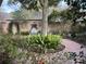 Landscaped courtyard features a decorative water feature, brick paving, and mature trees at 3358 Stonecrest Ct, Atlanta, GA 30341