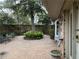 Beautiful courtyard offers patio seating and brick landscape with water feature at 3358 Stonecrest Ct, Atlanta, GA 30341