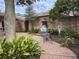 Landscaped courtyard features a decorative water feature and brick paving at 3358 Stonecrest Ct, Atlanta, GA 30341