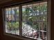 A bright window offers a clear view of the green exterior landscaping at 3358 Stonecrest Ct, Atlanta, GA 30341