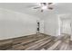 Spacious bedroom showcasing modern wood floors and neutral walls at 706 Cather Ct, Stone Mountain, GA 30088