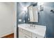 Elegant bathroom features a large mirror, modern lighting, and a sleek faucet at 1717 N Decatur Ne Rd # 322, Atlanta, GA 30307