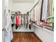Well-organized walk-in closet offering ample storage space with rods and shelves at 1717 N Decatur Ne Rd # 322, Atlanta, GA 30307