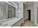 Large bathroom with double vanity, soaking tub, and separate shower at 4512 Evan Ct, Hoschton, GA 30548