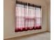 Bedroom with carpet and window with burgundy and black curtains at 4512 Evan Ct, Hoschton, GA 30548