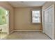 Bedroom with a window and a view to an ensuite bathroom at 4512 Evan Ct, Hoschton, GA 30548