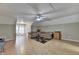 Bonus room with hardwood-style floors, ceiling fan, and lots of open space at 4512 Evan Ct, Hoschton, GA 30548